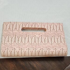 Elegant Pink Woven Clutch